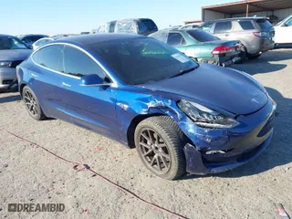 2018 Tesla Model 3 Long Range Battery with VIN 5YJ3E1EA2JF037835, listed as a IAAI auction lot 41667875 with 106,528 mi miles. Bid and sale history available at carsss.com. Image 1.