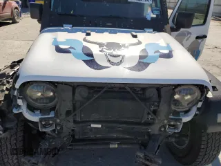 2023 Jeep Wrangler Sport S with VIN 1C4HJXDG3PW522449, listed as a Copart auction lot 41622185 with 25,436 mi miles and Salvage Title. Bid and sale history available at DreamBid. Image 12.