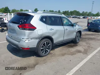 2017 Nissan Rogue SV with VIN 5N1AT2MV0HC832876, listed as a IAAI auction lot 42389131 with 73,856 mi miles and . Bid and sale history available at DreamBid. Image 4.