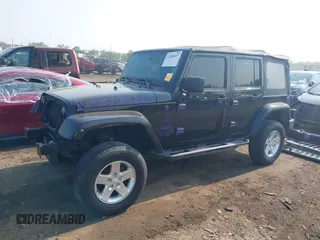 2014 Jeep Wrangler Unlimited Sahara with VIN 1C4BJWEG6EL217945, listed as a IAAI auction lot 42388477 with 61,739 mi miles and . Bid and sale history available at DreamBid. Image 18.