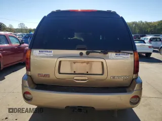 2004 GMC Envoy SLT z VIN 1GKET16S546133758, wystawiony jako Copart lot #76717674 z przebiegiem Nie podano mil oraz Szkoda całkowita • Salvage title. Historia ofert i sprzedaży dostępna na DreamBid. Obrazek 6.