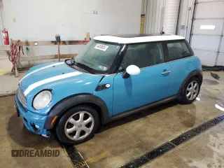 2009 MINI Hardtop with VIN WMWMF33569TW74610, listed as a Copart auction lot 54889805 with 147,533 mi miles and Salvage Title. Bid and sale history available at DreamBid. Image 1.