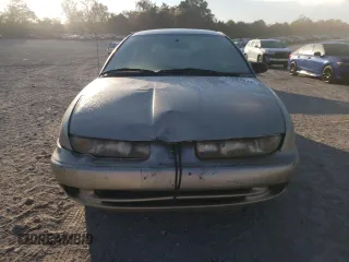 1998 Saturn SW z VIN 1G8ZK8279WZ246084, wystawiony jako Copart lot #77267514 z przebiegiem 143 224 mil mil oraz Tytuł czysty. Historia ofert i sprzedaży dostępna na DreamBid. Obrazek 5.