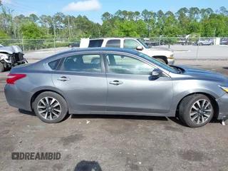 2018 Nissan Altima 2.5 SR with VIN 1N4AL3AP3JC127999, listed as a IAAI auction lot 42016201 with 120,628 mi miles. Bid and sale history available at carsss.com. Image 13.
