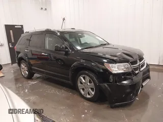 2014 Dodge Journey Limited with VIN 3C4PDDDG7ET154300, listed as a IAAI auction lot 41640132 with 175,276 mi miles and . Bid and sale history available at carsss.com. Image 1.