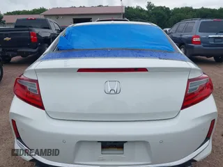 2016 Honda Accord Touring with VIN 1HGCT2B09GA007614, listed as a IAAI auction lot 42532621 with 200,935 mi miles and . Bid and sale history available at DreamBid. Image 16.