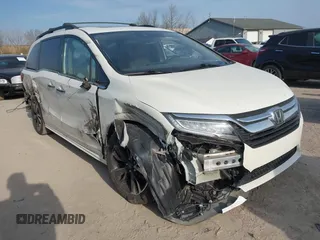 2019 Honda Odyssey Elite with VIN 5FNRL6H90KB019835, listed as a IAAI auction lot 42054752 with 110,659 mi miles and . Bid and sale history available at DreamBid. Image 1.