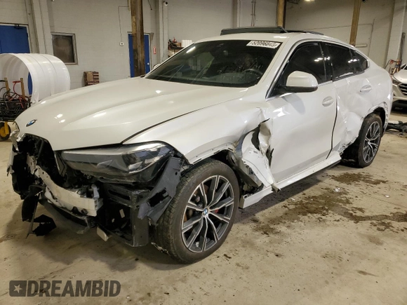 2020 BMW X6 xDrive40i z VIN 5UXCY6C07L9B43453, wystawiony jako Copart lot #52096845 z przebiegiem Nie podano mil oraz Szkoda całkowita • Salvage title. Historia ofert i sprzedaży dostępna na DreamBid. Obrazek 1.