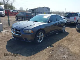 2014 Dodge Charger SXT Plus with VIN 2C3CDXJG0EH104680, listed as a IAAI auction lot 41784303 with 135,771 mi miles. Bid and sale history available at carsss.com. Image 18.