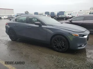 2025 Mazda 3 S Carbon Edition with VIN JM1BPBCM3S1767854, listed as a Copart auction lot 43643335 with 1,065 mi miles and Salvage Title. Bid and sale history available at DreamBid. Image 4.