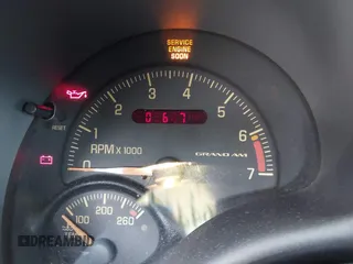 1999 Pontiac Grand Am SE2 with VIN 1G2NE52T0XM702788, listed as a IAAI auction lot 42564414 with 195,067 mi miles and . Bid and sale history available at DreamBid. Image 12.
