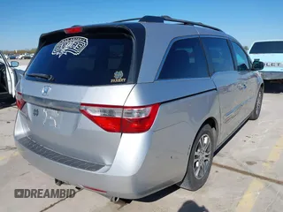 2012 Honda Odyssey EX with VIN 5FNRL5H48CB131881, listed as a IAAI auction lot 41822159 with 354,718 mi miles and . Bid and sale history available at DreamBid. Image 4.