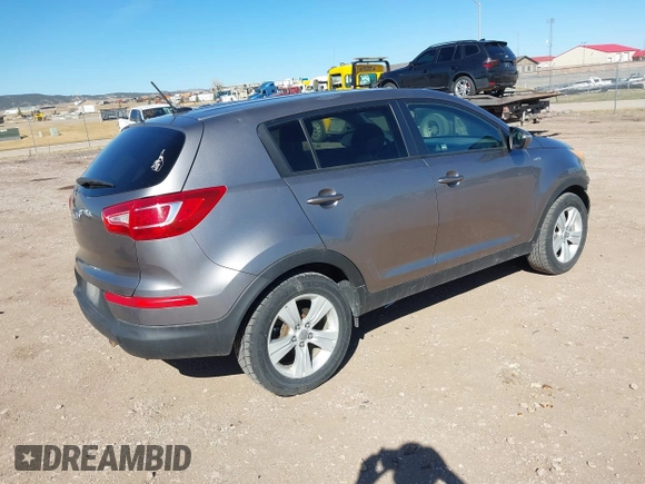 2012 Kia Sportage LX with VIN KNDPBCA27C7318056, listed as a IAAI auction lot 41887312 with 144,940 mi miles and . Bid and sale history available at DreamBid. Image 4.