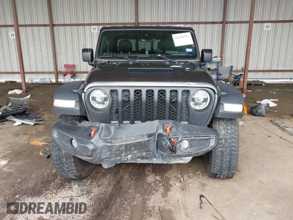 2022 Jeep Gladiator Mojave z VIN 1C6JJTEG8NL182360, wystawiony jako IAAI lot #42194516 z przebiegiem 67 658 mil mil oraz . Historia ofert i sprzedaży dostępna na DreamBid. Obrazek 6.