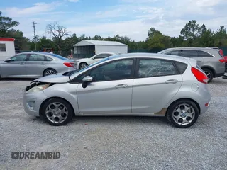 2011 Ford Fiesta SES with VIN 3FADP4FJ5BM232264, listed as a IAAI auction lot 40982622 with 184,726 mi miles. Bid and sale history available at carsss.com. Image 14.