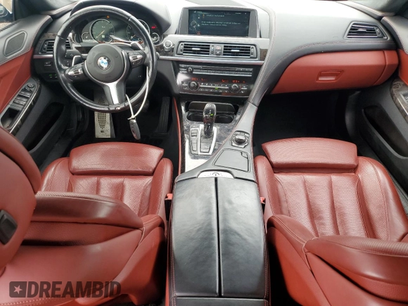 2014 BMW 6 Series 650i xDrive z VIN WBA6B4C53ED371461, wystawiony jako Copart lot #51136055 z przebiegiem 143 213 mil mil oraz Tytuł czysty. Historia ofert i sprzedaży dostępna na DreamBid. Obrazek 8.