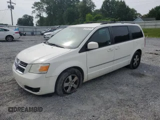 2010 Dodge Grand Caravan SXT z VIN 2D4RN5D1XAR460284, wystawiony jako Copart lot #57317375 z przebiegiem 124 617 mil mil oraz Szkoda całkowita • Salvage title. Historia ofert i sprzedaży dostępna na DreamBid. Obrazek 1.