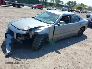 2006 Dodge Charger R/T with VIN 2B3KA53HX6H323577, listed as a IAAI auction lot 42128677 with 268,675 mi miles and . Bid and sale history available at carsss.com. Image 2.