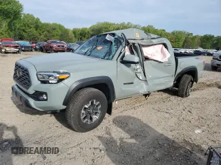 2023 Toyota Tacoma SR z VIN 3TMCZ5ANXPM622882, wystawiony jako Copart lot #53085845 z przebiegiem 11 207 mil mil oraz Szkoda całkowita • Salvage title. Historia ofert i sprzedaży dostępna na DreamBid. Obrazek 1.