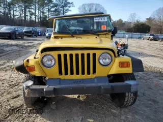 2001 Jeep Wrangler Sport with VIN 1J4FA49S21P312522, listed as a Copart auction lot 54698935 with 201,199 mi miles and Salvage Title. Bid and sale history available at carsss.com. Image 5.