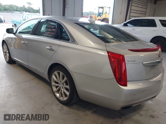 2016 Cadillac XTS Luxury Collection with VIN 2G61M5S34G9189820, listed as a IAAI auction lot 42660069 with 72,489 mi miles and . Bid and sale history available at DreamBid. Image 3.
