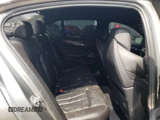 2018 BMW M5 z VIN WBSJF0C50JB283220, wystawiony jako Copart lot #62178853 z przebiegiem Nie podano mil oraz . Historia ofert i sprzedaży dostępna na DreamBid. Obrazek 10.