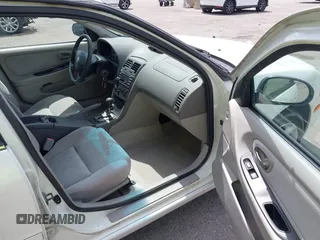 2003 Nissan Maxima SE z VIN JN1DA31DX3T501453, wystawiony jako IAAI lot #42116346 z przebiegiem 127 364 mil mil oraz . Historia ofert i sprzedaży dostępna na DreamBid. Obrazek 5.