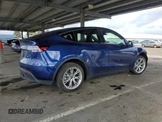 2024 Tesla Model Y Long Range with VIN 7SAYGDEE6RF025366, listed as a Copart auction lot 49328055 with 10,319 mi miles and Salvage Title. Bid and sale history available at DreamBid. Image 3.