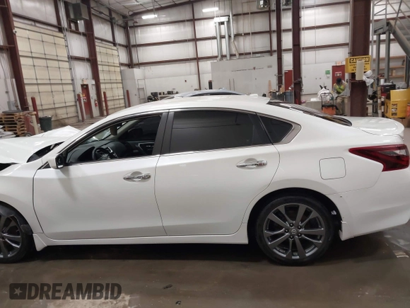2018 Nissan Altima SV with VIN 1N4AL3AP9JC271718, listed as a IAAI auction lot 41787242 with 73,523 mi miles and . Bid and sale history available at carsss.com. Image 14.