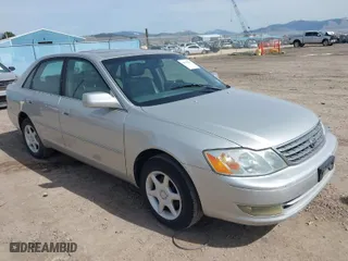 2004 Toyota Avalon XL with VIN 4T1BF28B84U345098, listed as a IAAI auction lot 41990582 with 223,836 mi miles. Bid and sale history available at carsss.com. Image 1.