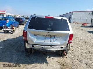 2010 Jeep Grand Cherokee Laredo with VIN 1J4PS4GK2AC155683, listed as a IAAI auction lot 41411133 with 211,803 mi miles. Bid and sale history available at carsss.com. Image 6.