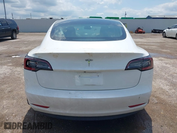2023 Tesla Model 3 with VIN 5YJ3E1EA5PF407054, listed as a IAAI auction lot 42313770 with 57,621 mi miles and . Bid and sale history available at DreamBid. Image 16.