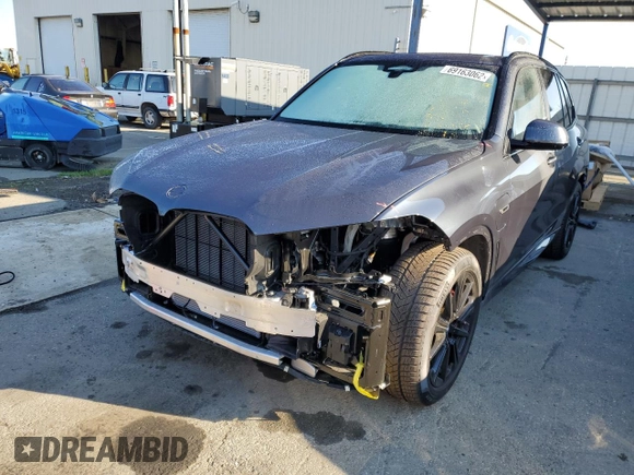 2022 BMW X5 xDrive45e with VIN 5UXTA6C04N9J66273, listed as a Copart auction lot 69163062 with 7,464 mi miles. Bid and sale history available at carsss.com. Image 1.