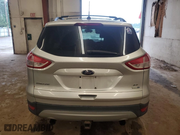 2013 Ford Escape SE z VIN 1FMCU9G90DUA34122, wystawiony jako Copart lot #60875735 z przebiegiem 174 118 mil mil oraz Szkoda całkowita • Salvage title. Historia ofert i sprzedaży dostępna na DreamBid. Obrazek 6.