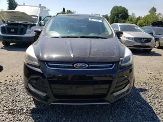 2015 Ford Escape Titanium with VIN 1FMCU9J94FUB31934, listed as a Copart auction lot 58327654 with 93,581 mi miles and Salvage Title. Bid and sale history available at carsss.com. Image 5.