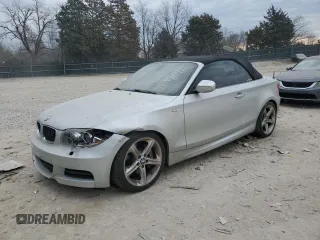 2011 BMW 1 Series 135i with VIN WBAUN7C52BVM24673, listed as a Copart auction lot 46976415 with 164,270 mi miles and Salvage Title. Bid and sale history available at DreamBid. Image 1.