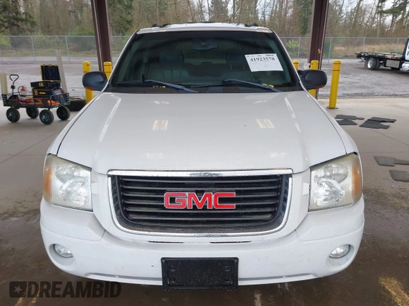 2003 GMC Envoy SLE with VIN 1GKDT13SX32319740, listed as a IAAI auction lot 41923578 with 210,811 mi miles. Bid and sale history available at carsss.com. Image 12.