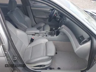 2003 BMW 3 Series 330i with VIN WBAEV53463KM04252, listed as a IAAI auction lot 42006945 with 193,387 mi miles. Bid and sale history available at carsss.com. Image 5.