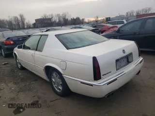 1999 Cadillac Eldorado z VIN 1G6EL12Y5XU600699, wystawiony jako Copart lot #88164505 z przebiegiem 140 075 mil mil oraz Szkoda całkowita • Salvage title. Historia ofert i sprzedaży dostępna na DreamBid. Obrazek 2.