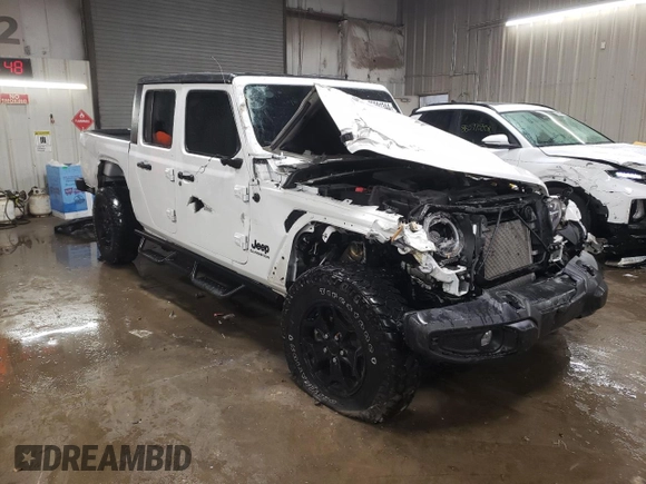 2021 Jeep Gladiator Sport S с VIN 1C6HJTAG2ML563219, выставлен на аукционе Copart как лот 85591344 с пробегом 46 842 миль миль и Списание • Salvage title. История ставок и продаж доступна на DreamBid. Изображение 4.