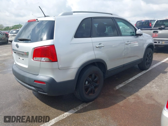 2011 Kia Sorento LX with VIN 5XYKT4A14BG074310, listed as a IAAI auction lot 42119815 with 215,660 mi miles. Bid and sale history available at carsss.com. Image 4.