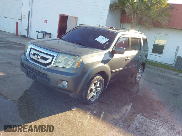 2009 Honda Pilot EX-L with VIN 5FNYF48579B014520, listed as a IAAI auction lot 41736577 with 204,704 mi miles. Bid and sale history available at carsss.com. Image 2.
