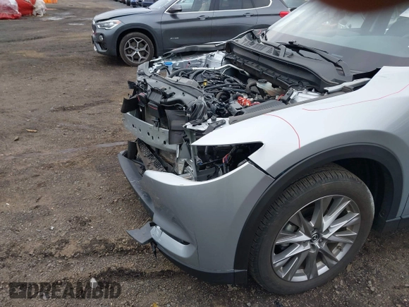 2020 Mazda CX-5 Grand Touring with VIN JM3KFBDM4L0843825, listed as a IAAI auction lot 41733575 with 18,800 mi miles. Bid and sale history available at carsss.com. Image 18.