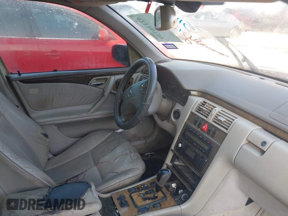 2002 Mercedes-Benz E 320 with VIN WDBJF70J02B477523, listed as a IAAI auction lot 42136739 with 251,354 mi miles and . Bid and sale history available at DreamBid. Image 5.