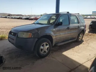 2003 Ford Escape XLS Popular with VIN 1FMYU02173KC05669, listed as a Copart auction lot 73762124 with 211,811 mi miles and Salvage Title. Bid and sale history available at carsss.com. Image 1.