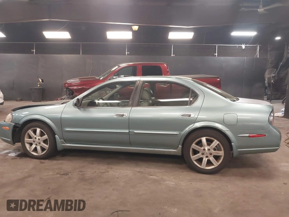 2002 Nissan Maxima GLE z VIN JN1DA31A12T308581, wystawiony jako IAAI lot #41742949 z przebiegiem 116 892 mil mil oraz . Historia ofert i sprzedaży dostępna na DreamBid. Obrazek 14.