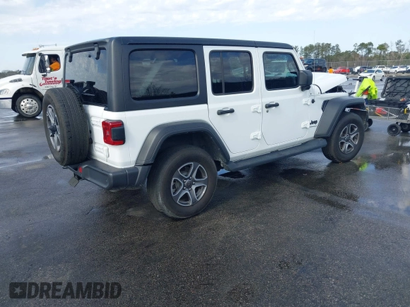 2023 Jeep Wrangler Sport S with VIN 1C4HJXDN9PW540842, listed as a IAAI auction lot 41712336 with 36,017 mi miles and . Bid and sale history available at DreamBid. Image 4.