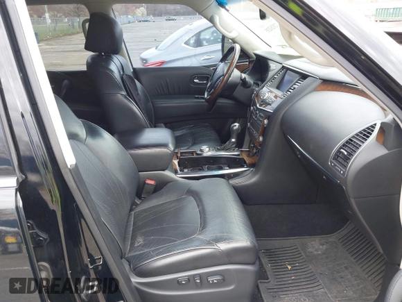 2012 Infiniti QX56 7-passenger z VIN JN8AZ2NEXC9020609, wystawiony jako IAAI lot #42026235 z przebiegiem 168 109 mil mil oraz . Historia ofert i sprzedaży dostępna na DreamBid. Obrazek 5.