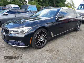 2016 BMW 7 Series 750i xDrive with VIN WBA7F2C50GG421005, listed as a Copart auction lot 73704114 with 67,740 mi miles and Salvage Title. Bid and sale history available at carsss.com. Image 1.