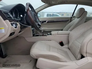 2014 Mercedes-Benz E-Class E 550 with VIN WDDKJ7DBXEF262970, listed as a Copart auction lot 77883184 with 118,948 mi miles and Salvage Title. Bid and sale history available at carsss.com. Image 7.